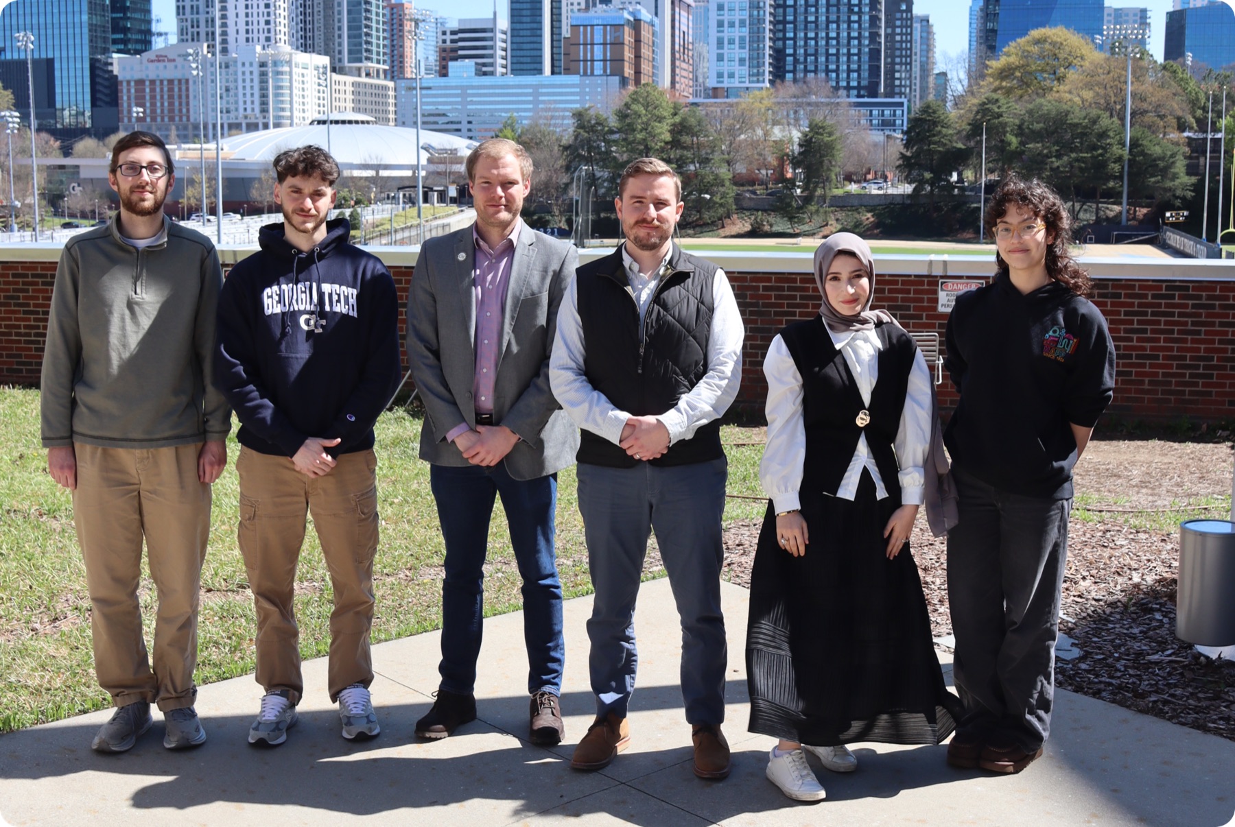 The Kreitz research group photographed together on the Georgia Tech campus, spring 2026.