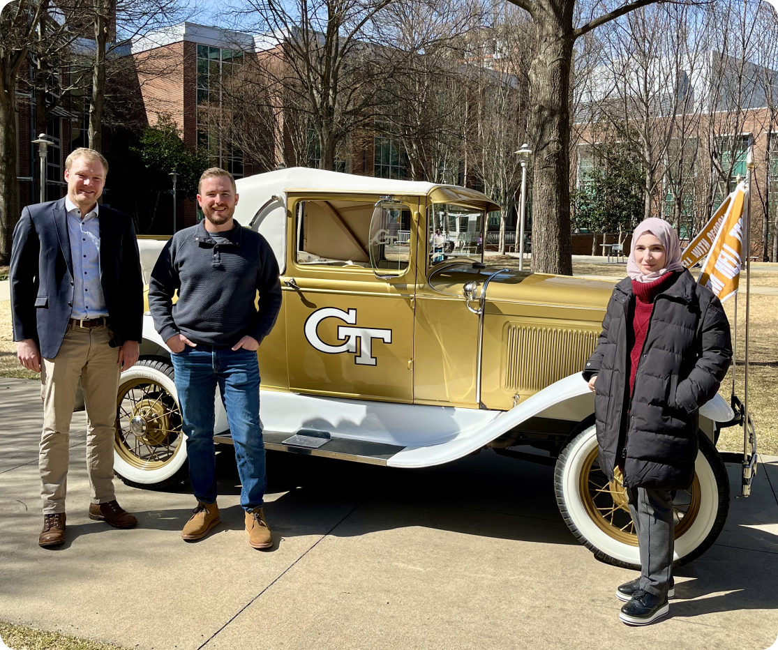 Group photo on with the Rambling Wreck, Spring 2026: From left to right: Seth, Bjarne, Shohda
